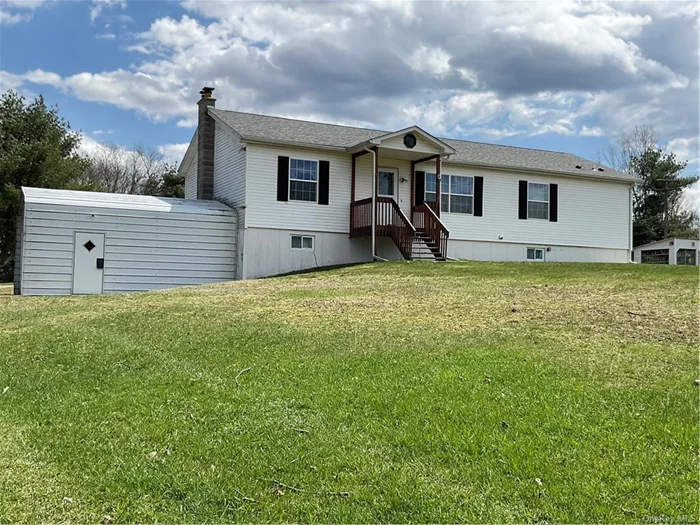 What a sweet well maintained ranch home, located in Cochecton, minutes to Bethel Performing Arts Center. Little over 3 cleared acres sits this 2004 ranch with barn/ workshop. Owners have lovingly maintained this home and it shows. Clean and neat and ready to move in. New septic tank 2 years ago, 4 years ago new well pump. Total strip and redo of roof 3 years ago. Home main level has 2 bedrooms , full bath and also a primary bedroom with a full bath. Eat in kitchen or separate dining are which faces the slider to large covered porch with handicapped ramp. This overlooking the large manicured back yard. The walk out basement is huge and dry, so can be used for may purposes. Addition barn/ workshop for storage and your outside needs. Also a small out building that I believe could make a great greenhouse. This home has much to offer, so come take a look.