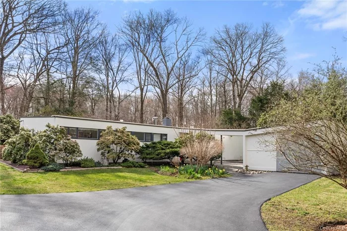 A rare opportunity for Midcentury Modern enthusiasts to own a house designed by renowned Bauhaus Architect Marcel Breuer in 1950. Privately set on a 3/4 acre, in-town parcel in the Village of Croton-on- Hudson, this 2, 292 square foot, one-story, 3-bedroom, 1 1/2 bathroom residence faces public woodlands through an expansive wall of windows. This architectural gem has been meticulously restored by the current owners. It&rsquo;s exterior features a distinctive butterfly roof, Cypress vertical siding, and steel casement windows, nestled against a rock outcropping. A central entry leads to three bright bedrooms on one wing, and free-flowing living spaces on the other. The living room features a unique locally- quarried stone fireplace, original bluestone floor, and oversized picture window framing the private patio and gardens. The updated kitchen includes stainless-steel cabinetry, Caesarstone countertops and all Bosch appliances. The original screened porch was enclosed as an open-plan concept family and dining room, and seamlessly added are a bright mudroom and large home office/studio. A bonus work area is the original one-car garage, which was converted to a 290 square foot finished space and used as a studio (not included in the listed total square footage). Extensive gardens, a fenced organic vegetable garden and stone pathways add to the outdoor appeal. The mature landscaping gives the house privacy, a feeling of seclusion and connection with nature. The house is a brief walk to the Croton Gorge Trail, which leads to Silver Lake, a locally-popular beach on the Croton River, and the in-town location has easy walking access to schools, library, shopping/restaurants and parks. It&rsquo;s a 5-minute drive to the train station, with express trains to Grand Central Station.