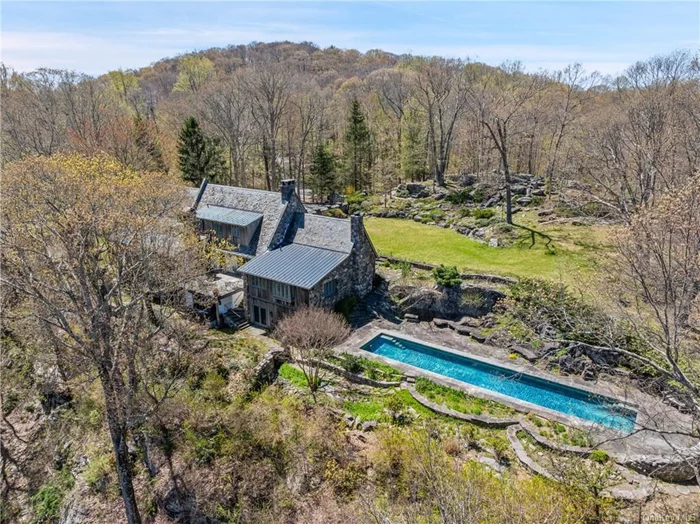 English Country Cottage. Never before offered! Nearly 5 estate acres on Bedford&rsquo;s Hook Road. Spectacular high site w/views of a private pond. Incredible setting w/flowering shrubs, fruit trees & pollinator&herb gardens. High stacked stone walls & dramatic rock outcroppings for perfect privacy. Capped with a slate roof, romantic Stone &Stucco Country Cottage reminiscent of the estates of the Cotswolds. Impeccably built reflecting old-world craftsmanship&design. Artisan-crafted plaster&native stone walls & antique wide brd floors. Impressive LR w/fpl, antique beams&Tudor-style paneling from an old British pub. Antique archway to wet bar w/ copper sink&antique etched-glass door. Country Kit w/fpl&door to dining porch. 1st flr Primary Suite w/fpl&2Bths. Private Guest Suite w/fpl&bth. Lge 3rd BR&Office/Guest Rm. Lower level Undercroth with spaces for entertaining. Cabana w/Kit &Bth. Spa Bth. Walled Garden w/heated Pool designed for lap swims. Hot tub overlooking walking trails & the BRLA.
