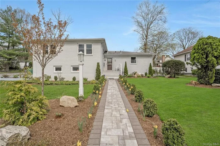 Step into this completely remodeled gem nestled in a tranquil street within the vibrant community of Wykagyl, right in the heart of New Rochelle. Conveniently situated on a gracious private corner-level property near schools, shops, the country club, transportation hubs, and more, this home offers the epitome of modern living. Prepare to be impressed upon entering with fabulous custom details that include Venetian plaster walls, vaulted and recessed ceilings, solid doors, glass railings, and so much more. The chef&rsquo;s kitchen boasts state-of-the-art stainless steel appliances, sleek white quartz countertops, and a spacious center island, an ideal setting for culinary creations. Descend to the expansive lower level with an additional 400 sq ft, perfect for relaxation or productivity. Discover a cozy playroom with a fireplace, designated office space for virtual meetings or an au pair/guest suite, a sizable laundry room, a walk-in pantry, and direct access to the oversized one-car garage. Retreat to the luxurious primary bedroom suite featuring an indulgent spa bath complete with a soaking tub and a separate shower. Two additional generously sized bedrooms with custom closets and a new hall bath round out this level. Step outside to your private backyard oasis featuring a brand-new blue porcelain patio and a gourmet outdoor kitchen, perfect for seamless alfresco entertaining. Located mere steps from lush Nature Study Preserves, ideal for leisurely strolls, invigorating hikes, horseback rides, and serene nature observation. Don&rsquo;t miss the opportunity to make this exceptional residence your own!