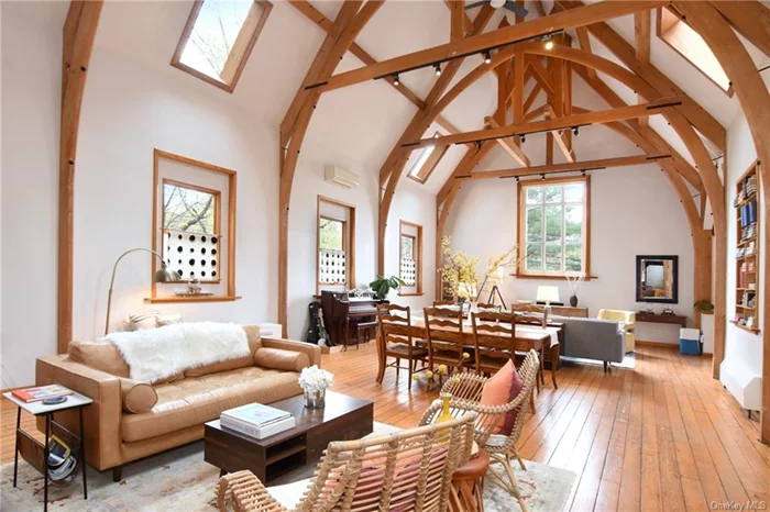 Step into a piece of history in the charming village of Tarrytown. Built in 1875 as a chapel, this iconic architectural beauty has been thoughtfully restored to offer a blend of historic charm and modern convenience, making it the perfect retreat for those seeking a unique living experience. Dutch doors welcome you at both the front and rear of the home. Prepare to be wowed by the grandeur of the 25&rsquo; ceilings adorned with arched wooden beams and stained glass. The strategically placed skylights invite the outdoors in, bathing the space in natural light throughout the day. The open floor plan offers a blank canvas for you to craft spaces that suit your lifestyle needs, currently utilized as a family room, living room and dining room. Inside, you&rsquo;ll discover a seamless fusion of old-world charm and modern updates. The main living area boasts beautiful hardwood floors, creating an inviting ambiance for both relaxation and entertainment. The updated dine-in kitchen features stainless steel appliances and ample counter space, perfect for culinary enthusiasts and casual dining alike. The primary bedroom with updated en-suite bath, a second bedroom, and hall bath with laundry complete the main living space. On the second floor you will find a large open loft perfect for a home office or flex space. Outside, a charming back patio awaits, providing the ideal setting for al fresco gatherings or simply basking in the beauty of the surrounding landscape. Don&rsquo;t miss the new roof! Conveniently located in the highly sought-after Blue Ribbon Irvington school district. Residents also enjoy the added benefit of Tarrytown village amenities. Residents can utilize either the Tarrytown or Irvington Metro North, both under 40 minutes into GC along the scenic hudson! Enjoy all both the village of Irvington and Tarrytown have to offer; five star restaurants, farmers markets, concerts at the iconic Tarrytown Music Hall and more! Whether you&rsquo;re drawn to the rich history, architectural marvels, or the vibrant community of the Rivertowns, this one-of-a-kind home offers a lifestyle unlike any other.