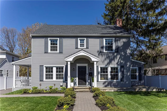 Welcome to 17 Meadow Avenue West, a classic center hall Colonial originally built in 1920 and completely transformed by an exceptional renovation in 2021. Located on a quiet cul-de-sac in the highly desirable enclave of Longvale, this picture perfect home was re-designed with incredible attention to detail. While retaining the warmth and charm of the original architecture throughout with abundant sunlight and hardwood flooring, the new design elevates the home with stylish features including; an impressive open-concept kitchen with an expansive island and access to a new rear deck with hot tub and firepit, a separate bar area, an open dining room that abuts a lovely covered porch, a large formal living room with wood burning fireplace, a renovated den/office space, and a picture perfect powder room. The second level features two nicely updated bedrooms, a great hall bathroom, and a spectacular primary bedroom with en-suite and expanded walk-in closet. Enjoy the privacy of the newly landscaped, private backyard while enjoying the large deck, firepit and hot tub. Mere minutes from the Village of Bronxville and Metro North, this dream home is a treasure.