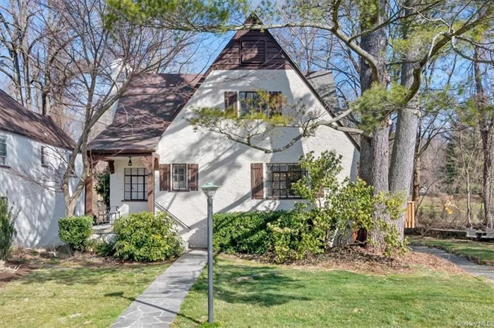 Exquisitely updated, sunny 4Br, 2 bath Tudor in the highly desirable Harbor Heights neighborhood in Mamaroneck. This home has been taken down to the studs and tastefully renovated with no detail forgotten. The first floor open floor plan features a LR w WBF, a chef&rsquo;s kitchen with a central island and loads of storage, and a dining area, again all open and light filled. There are two spacious bedrooms and a totally updated hall bath on the first floor.  There are sliding glass doors leading to a newly re done deck. The second floor features a large primary bedroom with two walk in closets. There is also a sizable family bedroom, a nursery/office, a second totally updated hall bath and a stackable washer/dryer. Gorgeous hardwood floors throughout the house. There is a beautiful private yard and a two car garage. Close to Warren Avenue Park.