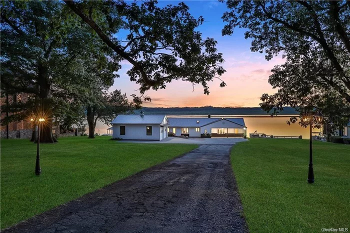WHEN ONLY THE BEST WILL DO.RARE OPPORTUNITY TO OWN ON THE NORTH END OF ORANGE LAKE - ONE OF THE ONLY MOTOR BOAT LAKES IN THE AREA - 140 FT OF DIRECT LAKE FRONTAGE- ENJOY PADDLE BOARDING, KAYACKING, FISHING, SWIMMING, BOATING & JET SKIING- 100FT STONE WALL & 40 FT OF STONE STEPS, BOAT LAUNCH, LARGE DOCK PLUS 20X20 FLOATING JET DOCK -THIS 2215 SQFT COMPLETELY RENOVATED RANCH WAS TAKEN DOWN TO THE STUDS OFFERING 3 BEDROOMS PLUS AN OFFICE & 2 FULL BATHROOMS.OPEN AND AIRY FLOOR PLAN -KITCHEN COMPLETE W COFFE BAR, BREAKFAST ISLAND, WINDOW SEAT, TILED BACKSLASH, ALL SS APPLIANCES & PLENTY OF CABINETS - SUNNY LIVING ROOM WITH GRANITE STONE FIREPLACE FOR THOSE CHILLY NIGHTS & 26FT OF CEILING TO FLOOR WINDOWS SPILLING OUT TO 60FT DECK FOR ENJOY OUTDOOR DINING OR WATCHING THE MAJESTIC SUNSETS.HARDWOOD FLOORS THROUGHOUT, FULLY TILED BATHROOMS -PLENTY OF CLOSETS, MUD ROOM, ALL GENEROUS SIZED BEDROOMS, NEW SIDING, METAL ROOF, COVERED PORCH, PAVER DRIVEWAY & OVERSIZED 2 CAR GARAGE -GREAT COMMUTER LOCATION JUST MINUTES FROM I-84, NYS THRUWAY & NEWBURGH BEACON BRIDGE.A TRUE MUST SEE.