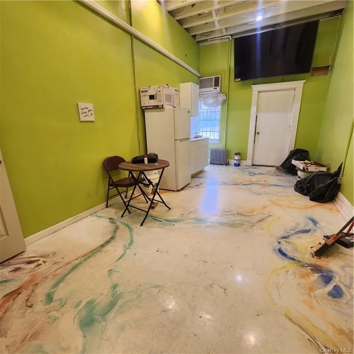Fantastic opportunity to live just 25 minutes outside of Manhattan, at 1/3 the Manhattan rent. This cozy studio offers an amazing private backyard, huge flat screen TV, and surprisingly large closet and beautifully redone bathroom.   All just 2 blocks to the St. Albans LIRR Train stop, just 1 stop to Jamaica Center, and 3 stops to Penn Station!   Utilities included!   Walls will be painted white but cool marble-style floors will remain. Pet friendly, perfect for a dog owner. Email now for a private tour!