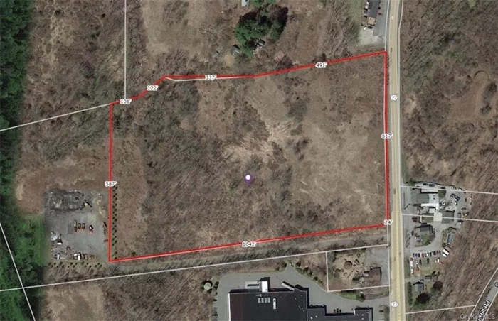 Level, wooded raw land zoned C1 - Shopping Center, Strip Plaza, Standalone Retail, Schools, Office, Medical, Light Industrial. Surrounded by commercial/industrial uses. Needs well and septic; electric on street. Owner seeking as-is deal but entertaining all offers.