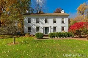 This historic C. 1830 Colonial house is beautifully sited and located at the end of a long private driveway. This spectacular 9 acre plus property is tranquil and nestled in a story book setting that overlooks a pond, frontage on the Wappingers Creek and spectacular waterfalls that you can hear from inside the house. Entertain family and friends on the deck that sits above the creek. Enjoy the gorgeous pool, open lawns, and majestic mature trees. The house has been thoughtfully updated preserving many original details. Original hard wood floors run throughout the house and there is an abundance of windows which lets in glowing natural light. The entry foyer opens onto the formal dining room and living room which has a lovely wood burning fireplace. The kitchen has been tastefully updated and there is an office/den. The laundry room and half bathroom complete the first floor. The Primary bedroom with en-suite full bathroom is on the second floor, and two additional bedrooms share an updated full bathroom. This is a unique property, a rare find. Close to the Taconic Parkway, shopping and restaurants. Close to Millbrook and Rhinebeck. Arlington School District., AboveGrade:2070, ExteriorFeatures:Outside Lighting, Heating:Zoned, Other School:DUTCHESS, Unfinished Square Feet:400, ROOF:Asphalt Shingles, Below Grnd Sq Feet:400