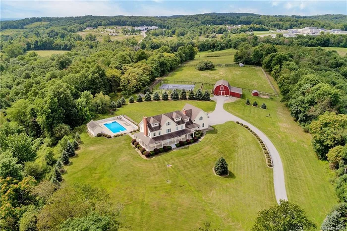 Rare Treasure! Incomparable, private, extraordinary, 46+ acre mini estate. 14 room, 6 bedroom, 3 bath colonial with panoramic vistas, 2 stocked ponds, 5 stall barn with water and electric, guest cottage with professional kitchen, paddocks, run in sheds, wine cellar, in ground salt water pool & cabana with lav., basketball/tennis court, trails, fields, nature, trees, wildlife and much more. Just minutes to historic Village of Goshen, Route 17, & access to Heritage hiking & running trail. Your own private paradise to experience the beauty of nature, farm, ride horses or possible subdivision with municipal water & sewer now available. Quality craftsmanship abounds in this manor with formal moldings, hardwood floors, 3 brick fireplaces & chef&rsquo;s designer kitchen, in-law quarters & much more. Close to major shopping, Route 17, Legoland, historic Village of Goshen amenities in one of the county&rsquo;s hottest locations. One of a kind property that uplifts your spirits and has endless possibilities.