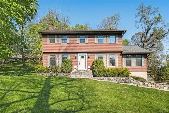 Located on one of Cornwall-on-Hudson&rsquo;s most desirable and conveniently located streets, sits this beautifully maintained center-hall colonial. The view from inside this spacious home is of trees, nature, and a stunning view of the mountains, giving you a feeling of serenity and privacy. It is perfectly situated in a neighborhood, close to all this charming village has to offer! From the house, you can walk to trails that will weave you through the woods and take you to the Hudson Highlands Nature Museum. Or walk in the other direction to the elementary school, restaurants, ice cream shop, and more. At the end of the street is the Village Bandstand where you can enjoy weekly summer concerts, watch town parades, and participate in various holiday celebrations. The master bedroom, complete with sitting/office area and a walk-in closet, also offers an en suite full bath with a cedar ceiling, skylight, and walk-in closet. There are 2 other generously sized bedrooms that share a full hall bath (also with cedar ceiling and skylight). The main level, with hardwood floors, includes an eat-in kitchen, living, family, and dining rooms, as well as a screened in porch - perfect for viewing the mountains! A wood stove in the living room is the perfect addition to this warm and inviting space. And you will be pleasantly surprised at the abundant storage found in the numerous large closets, ample kitchen pantry, basement, and attic. A 2 car attached garage and ample driveway allow plenty of parking for guests, should you want to entertain on the rear deck. In the award-winning Cornwall School District, just 9 miles to West Point, 8 miles to Stewart Airport/ANGB, 6 miles to Salisbury Mills Train Station, and about 60 miles from NYC.