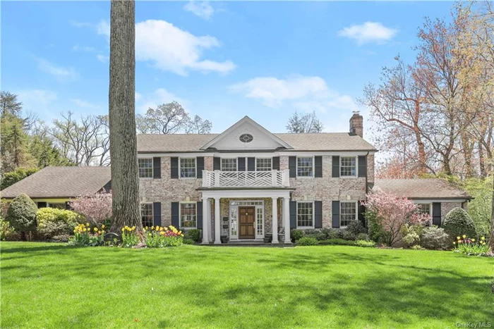 Elegant Colonial with a Hamptons-style backyard. This impressive center hall Colonial on sought-after Overlook Road blends unparalleled classic elegance, with modern luxury, showcasing a magnificent 2021-built 22 x 40&rsquo; infinity pool. Situated in one of Scarsdale&rsquo;s most coveted neighborhoods, this home offers exceptional convenience, just a short walk to the highly acclaimed Scarsdale High School, Fox Meadow Elementary School, and the recently renovated and expanded Scarsdale Public Library plus a 3-4 minute drive to the Scarsdale downtown shops and Metro North train. Upon entering, you will be greeted by a stunning foyer with a gorgeous winding staircase, setting the stage for luxurious living. Host special celebrations and holiday dinners in the lovely formal dining room and entertain graciously in the beautiful living room, boasting a wood-burning fireplace and built-in wet bar with wine fridge. French doors lead to a lavish home office, complete with built-in cabinetry and bookshelves, offering a tranquil and private workspace. The heart of this home is the expansive chef&rsquo;s kitchen with premium stainless steel appliances, including a side-by-side 36 inch Sub-Zero Fridge and Freezer, Viking professional range with 6 burners, griddle and two ovens, Miele Dishwasher and Miele coffee maker, Gaggenau steam oven, granite countertops, a chic, custom backsplash, a sizable center island with seating and extensive cabinetry including a desk area. A wall of windows and glass door to the Azek deck allow natural light to stream into the dining area, the perfect spot to linger over morning coffee with a picturesque view of the property and pool, seamlessly connecting indoor and outdoor living. An adjoining, spacious family room with a gas fireplace provides an inviting retreat. The first level continues to impress with built-in speakers in most rooms, a walk-in pantry, mudroom, laundry room, and a versatile guest bedroom/additional office with a full bath, along with an attached two-car garage. Step into an outdoor oasis where the Hamptons meets suburbia, with a fabulous 22 x 40&rsquo; gunite infinity pool, surrounded by Westwood granite decking. Entertain effortlessly with a built-in outdoor kitchen including a 48 inch professional DCS BBQ, two fridge drawers and a trash receptacle, outdoor TV, gas firepit and ample seating areas. The Azek deck, adorned with modern wrought iron railings, offers additional space for outdoor dining and relaxation, while the extensive landscaping provides the ultimate privacy and lush greenery. An expansive, level backyard area offers an ideal setting for both recreational play and hosting grand gatherings. The second level boasts a luxurious primary bedroom suite with three walk-in closets and a spa-like Waterworks bath, featuring a double vanity, air-jetted tub and steam shower. Three additional generous bedrooms, one with an ensuite bath and two sharing a hall bath, provide comfort for loved ones and guests. The bright lower level offers two large recreation rooms, providing a casual space to relax and unwind, with access to an additional granite terrace and the enchanting backyard. This home exudes warmth, sophistication and gracious elegance throughout and has been meticulously maintained and extensively updated by the owners with a commitment to the highest quality, with new HVAC systems, roof, windows, infinity pool, decking and landscaping plus a full house 38 KW generator. Experience the epitome of luxury living at Ten Overlook Road.