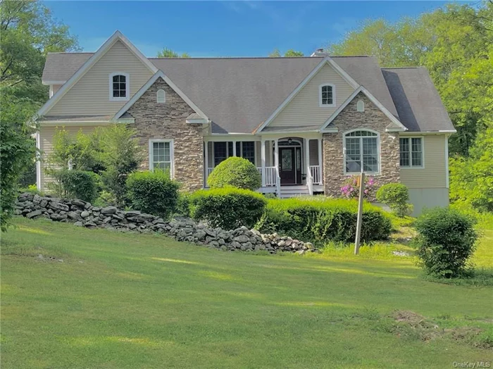 Welcome Home to your super private , luxuriously sprawling contemporary Ranch that is 5 minutes off the Taconic State Parkway. Stand outs of this home include a lovely screened back porch which connects to the Kitchen , Great room and Primary suite which overlooks a spectacular back yard boasting 6.73 acres of privacy and gardens. In the winter, cozy up to the stunning floor to ceiling stone woodburning fireplace in the Great room which centers the house and perfectly separates the Primary suite from the other bedrooms. A large bonus room upstairs and massive (unfinished) basement with 10 foot ceiling and a french door walkout give this home tons of space . Beautiful cherry floors will lead you to the well appointed kitchen featuring cathedral ceilings, lots of light , 2 breakfast bars and quartz countertops. The stone walkway with gorgeous gardens welcome you to this lovely and unique home-