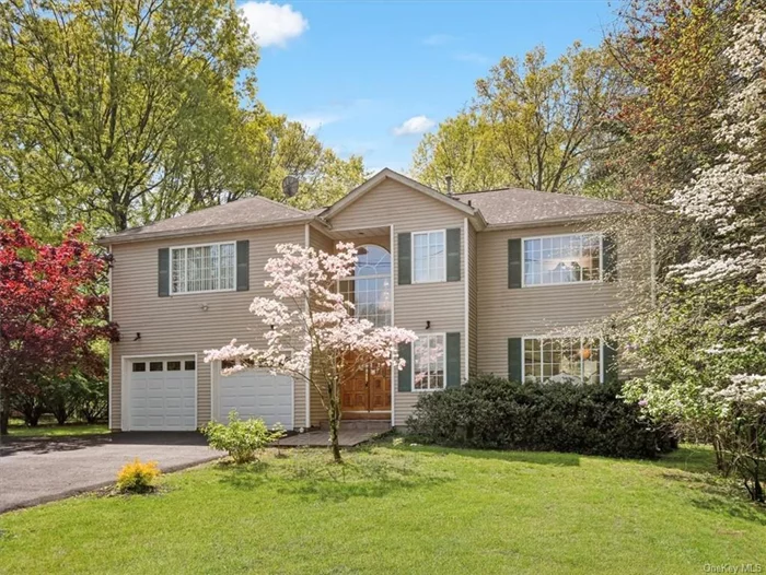 Walk through the beautiful mahogany doors of this bright & airy center hall colonial in New City, one of the highest rated suburbs in NY. Boasting 4 spacious BRs all with WICs, 3.5 baths & over 3300sf of living space, it is beautifully situated on .62 acres complete with pergola over the deck w/luscious grape vines in the summers, gazebo, & a peaceful natural setting. Within walking distance to vibrant Main St, the Kennedy Dells Park trails & public trans. The sunny kitchen is completely renovated w/granite counters & ss appliances. Open layout w/large Anderson windows and HW floors throughout seamlessly connects the family rm w/FP, large formal dining rm & beautiful living rm. Full finished newly renovated basement w/full bath provides addt&rsquo;l rec space. The majestic primary suite features 2 WICs & an updated ensuite bath w/jacuzzi & marble counters. 3 addt&rsquo;ls spacious bedrms & laundry rm on same floor. Top-rated Clarkstown SD w/very LOW taxes, this property presents a rare opportunity!