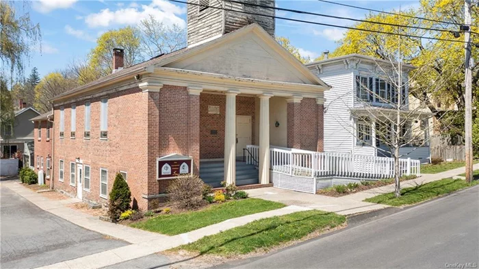Nestled in the charming Historic District of Athens, NY, this magnificent Solid Brick Church built in 1832 offers endless possibilities for a visionary owner. Steeped in history, this architectural gem presents a rare opportunity to create something truly extraordinary. Whether you dream of preserving its sacred beauty as a place of worship or envision a stunning conversion into a one-of-a-kind residence, professional office, or many other options, the choice is yours. With its soaring ceilings, intricate stained glass windows, Hardwood Floors, and bell tower, this property exudes character and charm at every turn. The main level features a Sanctuary, 2 Offices, a Conference Room, and a Study. The Walk-Out Lower Level flooded with natural light offers a Large Kitchen, a Massive Recreational Area, Bathrooms, and Utility Areas. Perfect for a variety of uses and activities! The building boasts almost 6000 square feet of space, with a one-car detached garage and ample off-street parking available. Municipal Water and Sewer. Located in a PRIME Village Location near 2nd Ave with easy access to local amenities and the picturesque Hudson River, this property is a gateway to unlimited potential. Perfect for outdoor enthusiasts with a kayak launch, hiking, and exploring trails nearby. Discover trendy Hudson NY, wineries, and more just a stone&rsquo;s throw away. Embrace the opportunity to bring new life to this historic treasure and create a legacy that will endure for generations to come.
