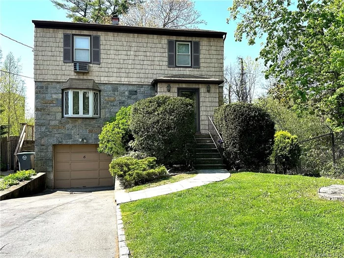 Welcome to 6 Hillside Ave in Pelham, NY. A charming 1, 476 sq. ft. colonial-style home sitting on 0.1455-acres lot,  with an additional 400 sq. ft. in the finished lower level that&rsquo;s NOT included in total sq. ft. On the second floor you&rsquo;ll find a primary ensuite, 2 additional bedrooms, a linen closet and hall bathroom. The main floor layout consists of an entryway with 2 closets, a large living room, a formal dining room, a hall bath & a kitchen that opens to a deck & fenced yard perfect for outdoor dining & leisure. The lower level is finished with sliding glass doors leading to the yard & it has a powder room. The basement is quite adaptable as it could be perfect for a family room or office. Additional storage is available in the attic accessible via pull-down stairs. Amenities include close proximity to transportation, parks, schools, & shops, enhancing your living experience. This home combines comfort, convenience, & classic style, making it an ideal choice for family living.