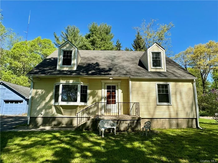 Welcome to this freshly painted interiors 4-bedrooms and 2 full bathrooms located at Minisink Valley School District. The open-plan living room and kitchen feature large bay windows, allowing the spaces with natural light. The kitchen has brand new cabinets with granite countertops. Brand new electrical wiring, fuse panel box and dish washer. Freshly painted interiors. Laundry room on the first floor equipped with a utility sink. Enclosed porch provides a bug free spot to enjoy a meal in fresh air. Additional features include detached garage and a storage shed. Close to train station, Park, Restaurant, Grocery store.