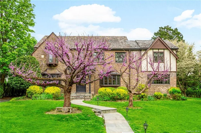 Welcome to this enchanting storybook Tudor, a move-in ready gem that combines the allure of old-world charm with the conveniences of modern living. Perfectly situated within walking distance to Fox Meadow Elementary (0.1 mile), Scarsdale High School(0.6 mile), the train station (0.5 mile), and the library (0.5 mile), this home is the epitome of prime location and classic elegance.  Formal occasions are well-served by the elegant living and dining rooms, where you can entertain guests amidst the refined ambiance of a bygone era. The sunroom-like library/office provides a bright and inspiring space for remote work. The heart of the home is the bright and airy eat-in kitchen, which has direct access to the backyard patio, making it perfect for indoor-outdoor living. Whether you&rsquo;re hosting a summer barbecue or enjoying a quiet morning coffee, this space seamlessly extends your living area into the great outdoors. As you step out, you&rsquo;re greeted by a large, flat private yard, an oasis of serenity featuring a beautiful pergola ideal for outdoor enjoyment and entertainment. The meticulously landscaped grounds invite you to indulge in the privacy and tranquility of your own backyard retreat.  Up in the second floor, retire to the luxury master suite, a sanctuary of peace and relaxation, featuring a spacious walk-in closet, a spa-like bathroom with radiant floor and a balcony that offers a daily retreat. Two additional sizable bedrooms share a hall bath. The separate guest room wing away from everyone but with its own hall bathroom offers privacy and comfort for your visitors. The second-floor activity room is a versatile space where one can gather for games, movies, or simply to relax.   Premier location, timeless curb appeal, elegant interior and space inside and outside aplenty, this home is the ideal backdrop for creating cherished memories. Welcome to a home that&rsquo;s not just a residence, but a story waiting to unfold.