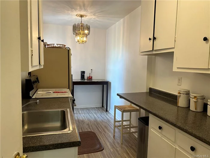 Welcome to the beautiful Valentine Gardens. Spacious one bedroom unit with dining area. Plenty of closet space. Laundry on site. Close to public transportation, shopping , schools and parks. Heat , water and Electric included in HOA. Beautiful flower lined court yard.