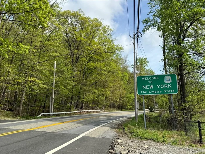 BLANK CANVAS. 4.5 Acre Building Lot in picturesque Greenwood Lake.  Buy this lot and make your lake house dreams come true. There are TWO Potential Building Lot locations. Both offer lake views. Approximately 900 feet of road frontage, and a two-lot sub-division (permissible with a variance from the town).   Love hiking? Look no further. The neighboring lot is owned by the United States of America Land Holdings, Part of the Appalachian Trail, to the rear, so you can expect the peace and quiet of the tranquil mountain.  The property itself is not lakefront, however it sits just across the street from the waterfront. Greenwood Lake Marina is just a few feet away.  You can access the public beach and the bus to NYC is 200 feet from the lot as well.   Come build your dream home here in Greenwood Lake and enjoy al that the Lake Community has to offer. Make this lot your new home!