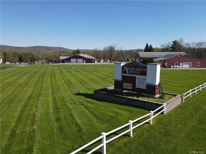 Orange County, NY. Zoned industrial. Office/warehouse space.  1 Acre Lots available for parking and out door storage. 10 Acres have Paved parking areas and level storage areas for lease. Landlord is offering parking areas in 1 acre increments. Close to highways, excellent location 5 minutes from Middletown, Route 17 and Interstate 84. Security Cameras and Security Lighting for all parking areas and through out this idyllic industrial ware house complex.  Great for fleet parking/storage for up to 200 trucks/tractor trailers/buses. Property is within 1 mile of of easy accessibility to major highways, located in established industrial park with plenty security lighting and surveillance cameras. Property is perfect for utility truck parking, school bus parking, fleet trucking, tractor trailers, paving company, construction, landscape/tree company, etc...etc.... Space is flexible to suit any need. Plenty of room for turn around and ease of maneuverability .