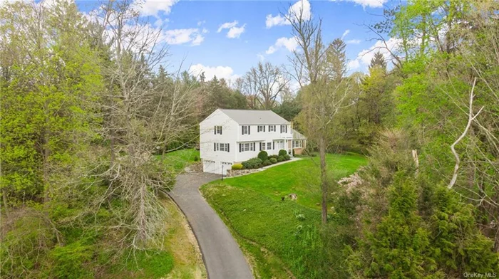 Welcome home to this completely renovated and beautifully remodeled Colonial nestled in Ridgefield&rsquo;s sought-after neighborhood of Westmoreland. Featuring prime access to the community&rsquo;s fantastic recreation area across the street, walk over to enjoy the two pools, tennis court, basketball, playground, and clubhouse with social events throughout the year! No stone was left unturned in the remodeling process - the seller has invested over $400, 000 in full interior and exterior improvements including Central Air to be installed soon! The Foyer entrance features beautiful white marble flooring, an adjacent Dining Room with a large bay window, and a gorgeous airy Living Room with a vaulted ceiling and a deep brick wood-burning fireplace. The Kitchen showcases dark brown custom cabinetry, marble countertops, an eat-in island, white marble backsplash, all-new GE stainless steel appliances, an oversized pantry with cedar shelving, a spacious dining area, and sliding doors to the large deck overlooking the expansive level backyard. The Family Room is bathed in tons of natural light accented by large windows. A half bath and laundry area complete the main level. The 1, 580 Sq Ft finished lower level features a Rec Room, Bonus Room, utility room, and a cozy lit nook underneath the staircase, with easy access to the two-car garage. The second level comprises four bedrooms including the Primary Bedroom with en-suite bath and dressing area, and one full hall bath. Highlights include freshly sanded and polished hardwood floors throughout, freshly painted throughout, all new drywall, new ceilings, new doors, newly renovated bathrooms donned with marble floors, showers, and vanities, Bidets and LED medicine cabinets, new washer/dryer, new LED motion sensory lighting in all closets, new cedar shelving in all closets, new exterior siding and gutters, new oil tank, updated driveway, updated roof, new attic fan, new central vac, new electrical, and an updated two-car garage featuring a newly installed electric car charging station. Not to be missed is the charming cement-sealed root cellar (dating back to the 1800s) for excellent storage! Located in South Ridgefield, you are minutes away from town center and are a short ride to Metro North trains and Route 7 for easy commuting!