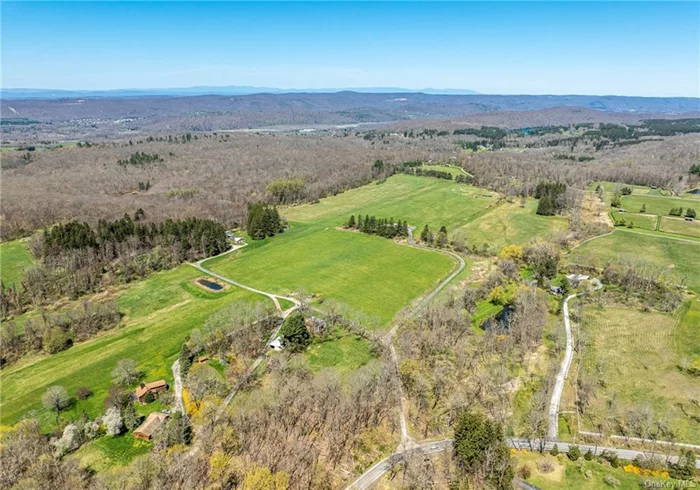An exceptional 68 acre property on the highly sought after Quaker Hill of Pawling. The parcel features 24 acres of clear and level land seamlessly blend with old woods crossed by meandering streams and historic trails dating back to the revolutionary era. Nestled in Quaker Hill&rsquo;s esteemed equestrian community, this property offers panoramic views of neighboring mountains and expansive estates. The possibilities here are vast: build your dream home amidst breathtaking vistas, utilize the ample cleared space (formerly a grass airstrip) for livestock grazing or horse paddocks, construct barns or a caretaker&rsquo;s cottage, and explore the 40 acres of wooded terrain with UTVs or hiking expeditions. With over 730 feet of frontage along Tracy Road and an entrance at a bend in Old Quaker Hill Road, the drive unfolds through cleared land leading to a spacious open area perfect for a residence, overlooking a vast pasture with unobstructed 360-degree views. This land, once an airstrip, now zoned as a horse farm by the town, showcases its equestrian potential with ample room for paddocks. Additionally, there is potential for subdivision, offering the opportunity to create two additional lots. Located just minutes from the charming Village of Pawling with its array of restaurants, bakeries, shops, pubs, and a Metro North station for convenient travel to NYC.