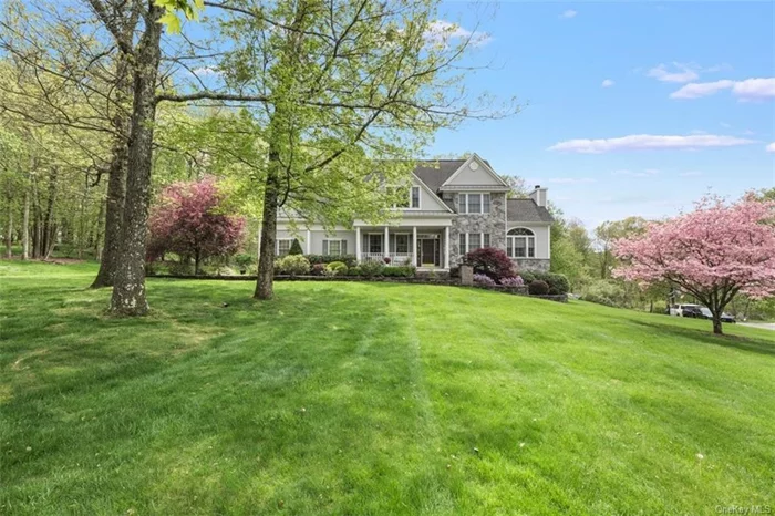 This beautiful 3, 874 square foot Colonial is located on a quiet culdesac in Hopewell Junction NY neighboring the popular Sagamore and Legends developments. Built in 2001, the single owner of this home has taken great pride in flawlessly maintaining everything from the manicured landscape to all of the critical electrical and mechanical systems. The level of care is obvious and the living experience is peaceful and comfortable. There are 3.5 Bathrooms and 4 large Bedrooms including the Master which has an ensuite bath, including jacuzzi. Just off the eat-in kitchen and family rooms is a comfortable screened in room perfect for getting some fresh air, and just relaxing. The basement is fully finished with kitchen, full bath,  a 5th bedroom, family room, covered patio and separate entrance. This is perfect for a game room, gym or for the senior parent who needs a little privacy space but close enough to make caring for them easier. Located minutes from the Taconic Pkwy, I84, Racquet Club and a 27 hole golf course, this home is a must see.