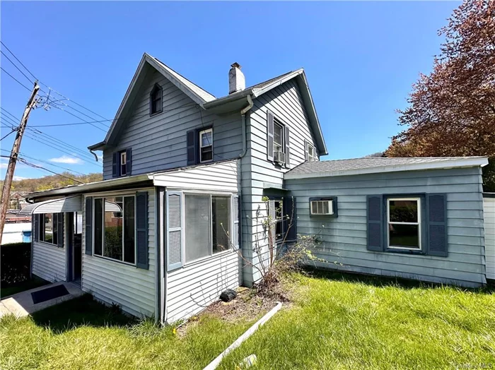 Bring your vision! Three bedroom two bath home in need of TLC. Multiple possibilities await your touches. Hardwood floors and a lot of original character. Close to train and commuter routes.