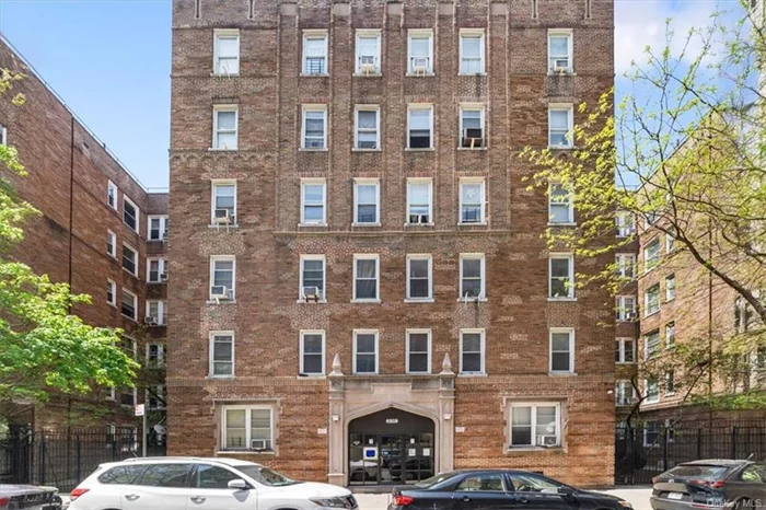 This charming 1-bed, 1-bath Co-Op boasts new windows, an inviting eat-in kitchen, and the security of a Gothic-style building with a digital FOB key system and security cameras. Enjoy nearby amenities like parks, the Bronx Zoo, restaurants, and convenient transportation options including the #2 & #5 IRT, #22, #39, and #12 buses, as well as express buses to Manhattan. Pet-friendly, hardwood floors, and a spacious living room and bedroom, make this your perfect urban retreat. Schedule your showing today!