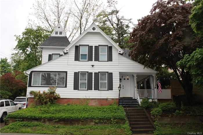 LOCATED IN THE HISTORICAL AREA OF POUGHKEEPSIE, THIS RECENTLY RENOVATED HOME IS WAITS FOR YOU! THIS HOME HAS CHARM, A CLASSIC BLACK AND WHITE COLONIAL EXTERIOR, WELCOMING WRAP AROUND PORCH AND PERRENIAL GARDENS ON EITHER SIDE OF THE STEPS! AS SOON AS YOU ENTER, YOU ARE MET WITH A BEAUTIFUL STAINED-GLASS WINDOW AND MUDROOM. THE 1ST FLOOR IS WONDERFULLY BRIGHT AND COZY, YOU HAVE A SPACIOUS KITCHEN WITH AN EXPANSIVE ISLAND, CUSTOM CABINETRY, QUARTZ COUNTERTOPS, EXPOSED BRICK, AND VIEWS OF THE YARD. BEAUTIFUL FRENCH DOORS WITH GLASS NOBS LEAD TO A ROOM THAT CAN BE A FORMAL DINING ROOM, DEN, OR OFFICE AND LEADS TO A 3 SEASON PORCH. THE LIVING ROOM OFFERS A WINDOW SEAT, PLENTY OF SPACE FOR ENTERTAINING, AND LEADS TO ANOTHER ROOM WITH NUMEROUS POSSIBILITIES, AS WELL AS ACCESS TO YOUR DRIVEWAY, SIDE STEPS, AND A WALKWAY TO THE YARD. UP THE STAIRCASE IS AN UP-TO-DATE HALL BATHROOM, 4 BEDROOMS WITH PLENTY OF CLOSET SPACE, A MASTER BATH, AND A VAULTED ATTIC WITH MORE LIVING SPACE! CALL NOW!