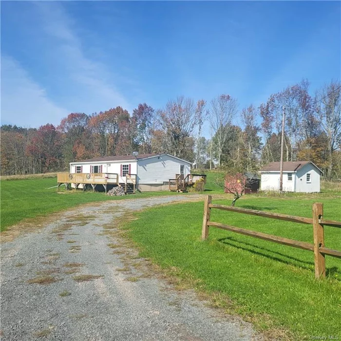 This 3 Bed/2 Bath Ranch style home is situated on a beautiful country road and is set on 3 acres of level, open land that is perfect for gardening and raising small livestock. The spacious rooms include a Master Bedroom, living area, eat-in kitchen and washer/dryer hookup /laundry area. Also includes a wood burning stove, 2 sheds, and 2 decks. Recent improvements include: brand new wall-to-wall carpeting, new exterior doors, deck, furnace, gutters, molding, windows, roof, stove, dishwasher, and sewer pump and line. This home is located close to the towns of Narrowsburg and Callicoon, Bethel Woods (original Woodstock Festival Site), Sullivan West School District, Lake Huntington and Catskill Resorts Casino. Low Taxes.