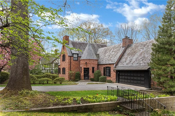 First time on the market in almost 70 years. Always admired for its stunning curb appeal, this 1925 French Normandy brick Tudor in the heart of the landmarked Cedar Knolls colony will win your heart the moment you step into its dramatic turreted enty foyer. The main living room/great room features 15 foot ceilings and a gorgeous period fireplace surrounded by custom built-ins. The first floor primary bedroom is flooded with light from the south and east. A paneled library completes the first floor. On the substantially above-grade lower level, a huge formal dining room with fireplace overlooks a lovely stone patio and attractive in ground 30 x16 heated pool. Adjoining the dining room, the expansive kitchen is fully operational and ready for its next chapter. The lower level also features a large panelled game room and another bedroom and bath. The second floor offers two additional bedrooms, a bath and an adorable turreted tower room topping off the fairy tale effect of this lovely home. And tucked away off the formal living room, a spacious home office is flooded with light all day. Two car attached garage, young central air, spacious bedrooms with WICs and more! Buildable lot next door (.26 acre) at 129 Birch Brook is also available for sale under MLS No.6306947.