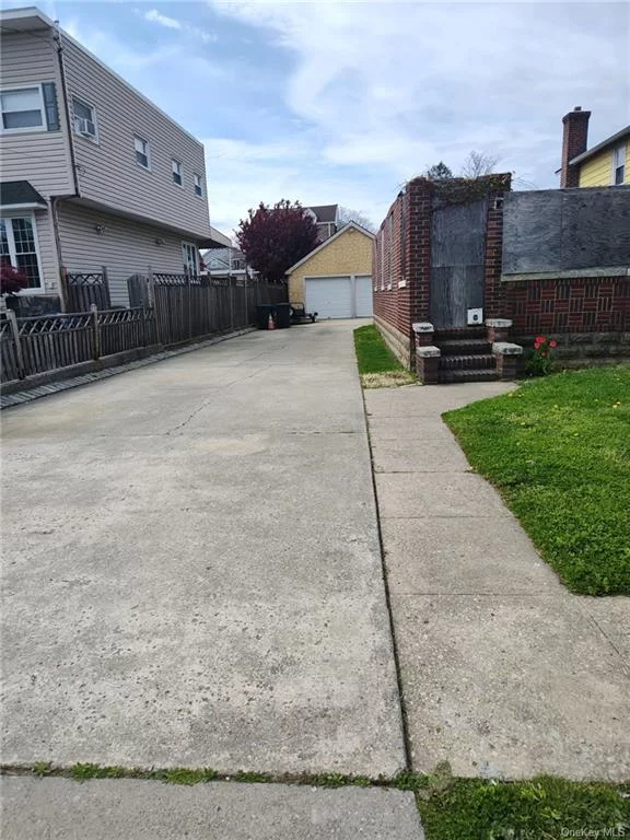 Come Build your new Single-Family Home or a Two Family Home on this Beautiful Level Lot Located in the Locust Point section of The Bronx. This Vacant Lot has a Two-Car Garage on the property & Existing Walls to start the building process. May be Permitted to Build up to 3 Floors. Located in a Prime Area. Make This Lot Into Your Dreams!