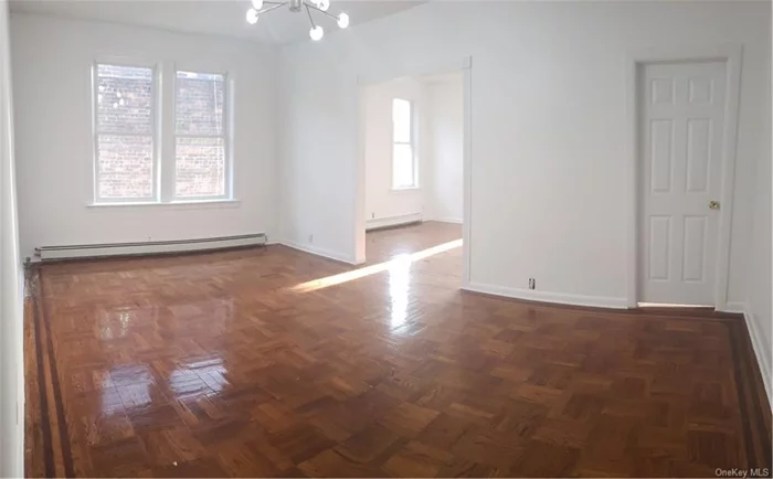 This four bedroom hardwood beauty in the Bronx is a must see! Two Updated bathrooms, closets in all bedrooms with a linen closet inside the bathroom! Brand new lighting and an abundance of windows allows extravagant amounts of sunlight in! The huge kitchen has long countertops and the dining area is one where you will host many holiday parties to come!