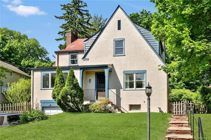 Got the househunting BLAHS? 120 Burnside Drive Hastings on Hudson is the cure! Welcome to a magical retreat, a 4 bedroom, 1.5 bath 1928 Tudor tucked in Shado-Lawn, on a quiet private lot with room to PLAY! Same-same pics blurring in your mind? Feast your eyes HERE - colorful custom updates talk to original details in the living, dining, and sunroom (incl great stone hearth, hardwood floors, built in bookshelves & window seat). 4 bedrooms & full bath upstairs, full basement with large storage capacity, a newly poured back patio and fenced in yard large enough for a block party, say it all: This house was built for good times. Close to park, schools, Village shops, trails, and the Rivertowns&rsquo; vibrant music/arts scene, Farmers Market, and more. Come join the fun!
