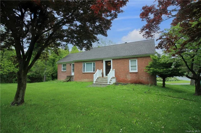 Charming and beautifully updated Cape Cod home. Easy upkeep exterior with the classic red brick siding. Located on a sprawling half an acre corner lot in Spackenkill School district. Move in ready, fully renovated in 2018 with new kitchen, bath, floors, roof, electric and plumbing updates. Main level includes a bright living room, Spacious eat in kitchen, family room, two bedrooms and full bath. Walk up attic with a den and additional storage room. Half bath in basement and access to the garage.