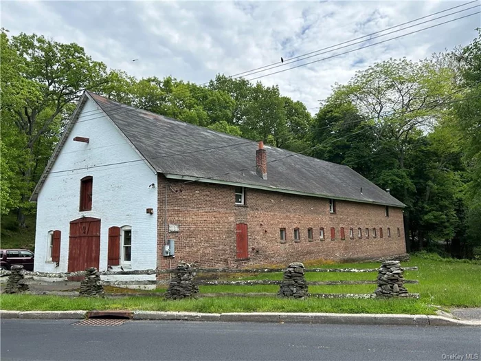 Imagine living in an historic brick Carriage House with an industrial chic twist. At your doorstep is 1538 acres preserved for wilderness and wildlife, with 2 lakes and 8 miles of biking & hiking trails. This property is contiguous to Blue Mountain Reservation and was once part of the large estate that donated this land. Exposed hand hewn beams and remnants of the original horse stalls are preserved in this 38&rsquo; x 100&rsquo;,  2 story barn. Fantastic opportunity if you need a live/work environment. Currently an amazing photo studio with 1 bedroom and 1.5 baths plus a kitchen/ living room area. There are endless possibilities for the creative spirit to create a unique living environment. The entire 2nd floor, currently used for storage, could be converted into several additional bedrooms. Plus many updates including extensive electric, split AC units and a security system. Located at the doorstep of the Reservation and Depew Park, 5 minutes from the Hudson River, Charles Point Marina, Metro North and only 50 minutes to Manhattan. If you ever dreamed of living in a historic barn, this property checks all the boxes and is a dream come true.