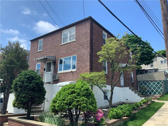 New to market. Great legal two family home located in the McLean Heights vicinity of Yonkers. There are two, two bedroom apartments, each consisting of kitchen, living room, dining area, bath, all hardwood floors. The finished lower level, complete with its own walk-in separate entrance, features 790 square feet in addition to the square footage listed above featuring large living room/dining room, kitchen, bedroom and bath. Large tiered, three levels, backyard, great for entertaining. Definitely a commuters dream as it is close to Metro North train, buses, shopping, parkways and Manhattan, 25 minutes.  Live in and collect rent or investment.