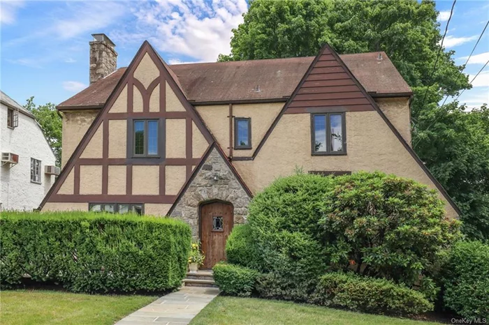 Superb location is the hallmark of this classic Tudor in Larchmont&rsquo;s coveted Poet&rsquo;s Corner. With 2224 sq ft, 4 bedrooms and 2.5 baths, this lovingly maintained home offers a traditional layout, well-proportioned spaces, and the ability to make it your own. The formal living room is spacious with French doors opening to a covered inset porch offering an intimate gathering place on balmy nights. The kitchen has a practical design with a side entrance allowing for easy access to the driveway. The sunny, cozy breakfast room creates another wonderful gathering space. The second floor has a large Primary Bedroom with 2 closets and a renovated Bath, 2 large bedrooms, and 1 smaller bedroom used as an office. Legal space in the basement (289 sq ft) not included in square footage. Features include: original details, newer casement windows and water heater (2019), 2 car garage, and a very large attic. Unrivaled convenience to Schools, Village and Train will make you say I LOVE THIS HOME!