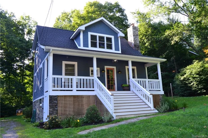 This charming front porch Cape has been totally renovated and expanded using top-of-the-line materials throughout. Living room w/original stone fireplace & refinished wood floors. The kitchen is a cook&rsquo;s dream w/ a huge island, quartz counters, upscale appliances and cabinetry. Laundry room with 1/2 bath off kitchen. Primary bedroom and full bath on main floor with a soaking tub and shower. Sliders out to yard off the kitchen. On the 2nd floor are two additional bedrooms w/spacious closets and full bath with double vanity. New roof, siding just painted, new windows & steps to porch. Large driveway, garage plus additional parking area. Basement is waiting to be finished. Workshop/storage room. Property includes extra wooded parcel to the corner. Lake is min. away to enjoy swimming, fishing, walking trails. Close to schools, library, shopping, park, train and I-84 for a great commute to Westchester/NYC. Taxes incl. trash pick-up 2X a week. Must see to appreciate! Just move in and enjoy your beautiful new home!