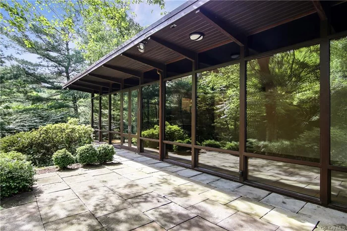 Special opportunity to rent iconic Mid Century home designed by legendary architect Edward Durell Stone. Stunning 3 bedroom/3 bath contemporary boasts walls of glass, 2 fireplaces, sleek, minimalist stylized construction nestled on wooded .89 acre adjacent to reservoir and Leatherstocking Trail. New Kitchen, Sumptuous primary bath, and Hall Bath. Looking like a contemporary home right out of the pages of Dwell magazine, its design is as bold and fresh today as it was when it was built in 1947-Hicks Stone. Edward Stone designed Radio City Music Hall, Kennedy Center, and Museum of Modern Art.