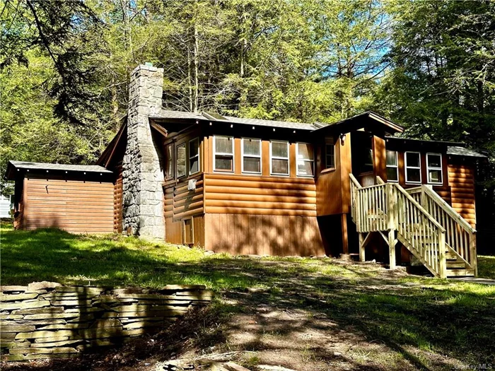 SMALLWOOD NY CABIN NEWLY AND BEAUTIFULLY RENOVATED (SALE INCLUDES SECOND LOT) - Welcome to this move-in ready home set privately on a dead-end road. Cabin features a total interior renovation that has been well done, rooms are bright/sunny and offers just the right amount of rustic for that country element. Some key features are a gorgeous stone fireplace, all new flooring, high ceilings, skylights, brand new appliances and upgrades to electric/plumbing. MAJOR improvement is a new septic system which is hard to find in Smallwood.  The home is set perfectly on a picturesque lot with mature trees, a gazebo and two out buildings for additional storage. Sale includes a second lot situatated behind the home and is cleared/open having the potential to be an amazing outdoor space, a possible pool location, patio with a burning pit or an amazing garden, this space has many options. Smallwood is a unique and inviting lake community, you&rsquo;ll love going to the beach on a summer day, walking/biking around the lake after dinner, hiking at the reserve, swimming in the heated pool at the clubhouse, going to the dog park, the adventures are endless just out your front door. Just about a 1/2 mile away is White Lake a 280 acre lake, open to the public with boat/jet ski rentals, restaurants on the lake makes this an exceptional location. Approximately 2+ hrs from NYC, 30 minutes to trains makes for a very easy commute. Close by you&rsquo;ll find many quaint towns for dining/shopping, the Delaware River for rafting/fishing, Bethel Woods Preforming Arts Center, Resort World Catskills, Kartrite Indoor Water Park, skiing, hiking trails and the best farmers markets you&rsquo;ll find anywhere, all for a beautiful life in the country.