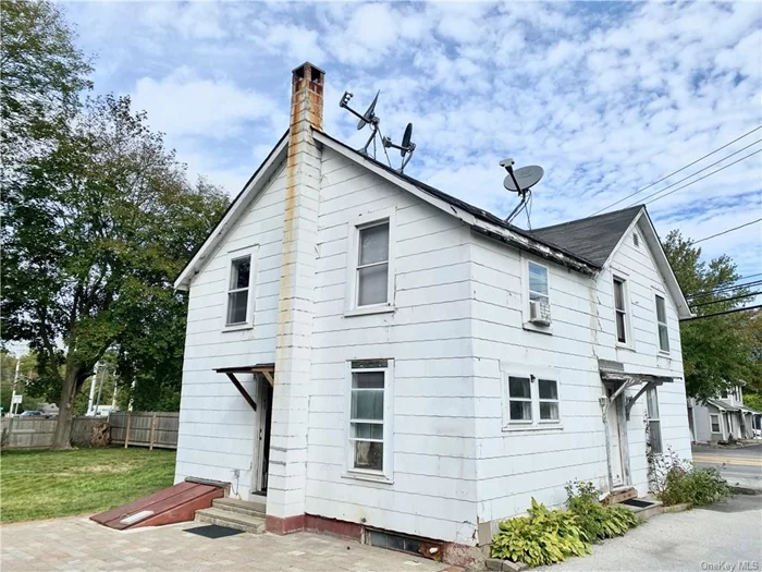 This property is located in East Park Business District, EPBD, where residential, nonresidential or commercial use is permitted through the Town approval process. The home is 1, 300 plus square feet with three bedrooms and a full bath. The main living level has a living room, dining room, kitchen, den/office and an additional media/office/ bonus room . The second floor has three bedroom and a full bath. The heating system was recently serviced. The roof is about 12 years old. The septic has a 1, 000 gallon concrete tank and was pumped in July. Close to shopping and medical facilities.