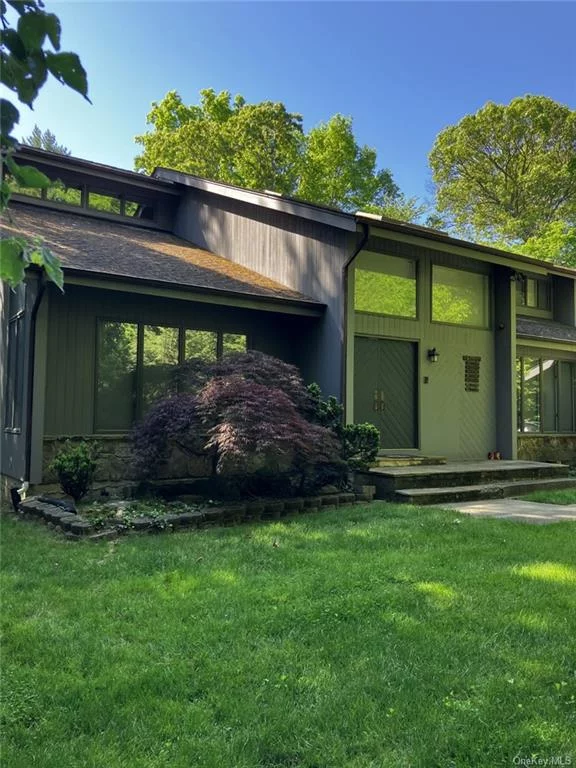 Beautiful contemporary home in the heart of Smithtown. Lots of skylights to bring lots of sun into this large, open floor plan. 9 rooms, 5 bed, 3 bath. Main floor bedroom/office and full bath. Hardwood floors. Second floor master with walk-in closet, separate sink area before entering the full bath with jetted, soaker tub. 3 beds and full bath. Oil and solar utilities (solar is very approx 1 year old and paid in full). Wood-burning fireplace in living room. 2 car garage. Backyard has a full deck that goes onto a beautiful, fully fenced yard, as well as a storage shed with automatic door opener. 2 car garage. Full basement, partially finished for storage, and a separate living space with full bath and walk out to backyard. Pull down attic for utilities and storage.