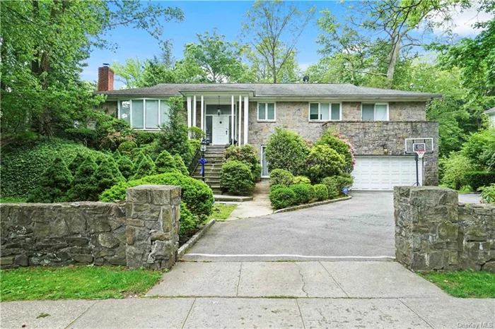 Looking for the perfect rental? Here it is! A wonderfully spacious 4 bedroom home in the lovely tree lined Estate section of Pelham Manor. This terrific rental is the perfect solution to open concept one floor living outside of NYC. Here you&rsquo;ll find a sprawling home featuring 4 nicely sized bedrooms - including a large Master en suite with spa-like bath, an oversized dual vanity hall bath, a sunlit Living Room with fireplace and Dining Room with glass doors to the yard. The large eat-in-kitchen offers easy access with sliders to the stone back patio and nearly 1/2 acre of yard and green space. There&rsquo;s a large lower level, offering more options and highlighted by a family room area, access to outdoors and another full bathroom (perfect for overnight guests). This unique home is a must see in terms of space and ease of living. Walk to nearby Shore Park, New York Athletic Club or get on your bike and enjoy the fresh air of nearby East Coast Greenway (ECG) trail. Nearby Prospect Hill Elementary School offers a large play space too! Don&rsquo;t forget to bring Fido - there&rsquo;s an electric fence so he can stay outdoors all day too! What a great way to try the &rsquo;burbs on for size!