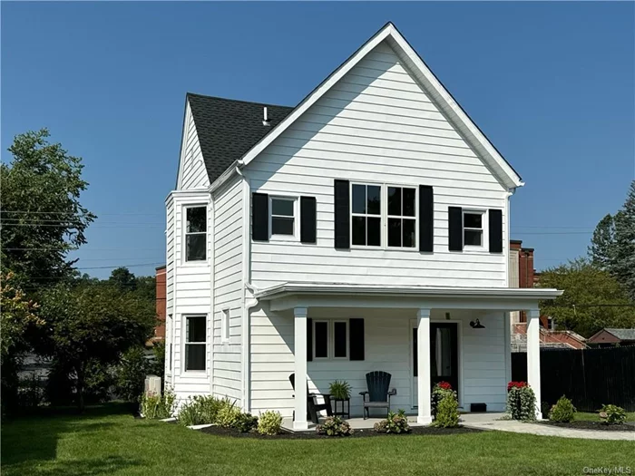 Beautifully renovated Farmhouse located 41 Fair St., is architecturally pleasing inside and out! Built in 1880, reborn in 2024,  completely renovated with an eye to detail! New roof line, New roof, New electric, New plumbing, New heating/AC system, New insulation, New kitchen, New baths, New design, New Landscaping, Everything is New! Super Convenient location, walkable to everything Uptown/Stockade has to offer, Art, Restaurants, Rail Trails, Farmers Market. Attention to detail in melding quality and charming features together make this your dream home! Entering from the back, a beautiful paved walkway to a spacious porch that you will enjoy your coffee or cocktails! Large entry greets your guests, with sparkling clean Hardwood flooring and recessed lighting acting as a blank canvas for your style of decor! Eat- in the Kitchen is generously sized with Custom Cabinetry, Quartz countertops, Beautiful new appliances, built in cubby spaces for all of your needs. Dining room has a Bow window to let the Sun Shine in! Living room is light, bright awaiting your special touches. Lovely Powder Room on the first floor with beautiful fixtures and ceramic tiled floor. Upstairs the Primary Suite is a Haven for relaxation , with vaulted ceiling and personal bathroom, extra large shower complete with artisan tile, glass doors and free floating sink amazing dressing room has been created through the use of built in Custom Built in Cabinetry, use as a Dressing room or a Nursery or whatever your heart desires! Two more bedrooms and full bath upstairs with beautiful tiling and finishing you would expect ! Full walk up attic for incredible storage, full dry basement for more storage and nice Laundry area. The exterior of this Lovely Farmhouse is framed by beautiful plantings, leaving a manicured lawn and move in ready home just waiting for you! Truly Move in ready, enjoy the Great Hudson Valley and all of its offerings!