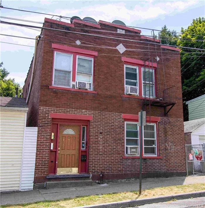 Fantastic investment opportunity or live rent-free in this spacious 3-family house located in the heart of Newburgh. Each unit offers comfort and functionality. The basement unit features 2 bedrooms, a cozy living room, a kitchen, and a full bath. The 1st-floor unit boasts 3 bedrooms, living room, kitchen, and a full bath. The 2nd-floor unit offers 4 bedrooms, a spacious living room, kitchen, and a full bath. Enjoy the convenience of a fenced-in backyard, perfect for outdoor gatherings or relaxation. This property is ideally situated close to transportation, shops, dining, and more, making it an attractive option for tenants and homeowners alike. The lower level unit (2 bed) is currently owner occupied, the first floor 3 bedroom ($1600) and second floor 4 bedroom ($1650) are month to month. Modest market rent of $1600, $1800 and $2000 respectively, the property would generate $65, 000 rent roll/year. and an NOI of approx $50, 000 - an 11.5% cap rate! Don miss out on this unique opportunity to invest in or reside in a versatile property.