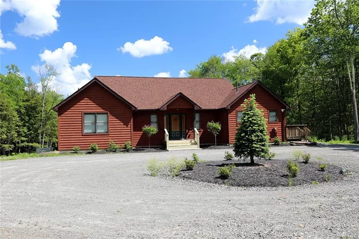 Price drop! Discover your dream home in the country with this lovely custom-built contemporary 4-BR, 2.5 bath home on 5+ acres of privacy! It&rsquo;s the perfect blend of modern design and natural beauty, featuring a spacious interior and great outdoor spaces. The expansive living area on the main level features high ceilings, gleaming wood floors and abundant natural light from windows with custom treatments. An open floor plan creates a seamless flow between the kitchen, dining and living areas. Creating meals will be a pleasure in the chef&rsquo;s kitchen, with gorgeous granite, stainless appliances and an island, overlooking the large deck where you can enjoy nature. 2 BR are on the main level, 1.5 baths and laundry/mudroom. Finished downstairs: find radiant heat, large family room, 2 BRs & full bath. Sliders get you out to the level yard. Central air, whole house generator, carport. Just a short drive to Roscoe, Trout Town, USA for eateries and shopping. Close to Livingston Manor & Callicoon.