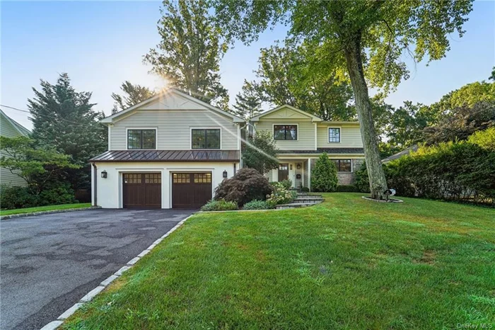 Nestled in the heart of Scarsdale in Fox Meadow you will find this beautifully renovated Split-Level home situated on a quiet, private lot. From the moment you arrive, pride of ownership is evident through the meticulously landscaped grounds and bluestone front walkway. As you enter the home, you are greeted by the custom detail throughout, from the grand herringbone floor in the foyer with walnut inlay to the elegant wood shiplap ceiling. The newly renovated custom eat-in kitchen is truly the heart of the home, featuring luxurious Sub-Zero and Wolf appliances, honed natural white Vermont quartzite countertops, and an expansive pantry. The primary suite offers the perfect setting for rest and relaxation, with a completely renovated en suite bathroom and an expansive walk-in closet. Indulge in spa-like relaxation in the bathrooms adorned with luxurious Dolomite Italian marble. The custom millwork and trim throughout the home add a touch of elegance and sophistication, while the remote controlled gas fireplace and Sonos speakers throughout the house enhance your living experience. The heated screened-in porch with blue stone flooring offers a serene retreat for enjoying the outdoors without the elements. Step outside to your private oasis. The saline heated Latham in-ground saltwater pool with lights and a cascading waterfall is surrounded by a pristine bluestone patio, perfect for lounging or entertaining. Enjoy year-round comfort with a heated 2-car garage and a new high-efficiency HVAC system. The property boasts a new architectural shingle roof, Hardie plank siding, all-new windows, a generator transfer switch, new spray foam insulation, and an irrigation system, ensuring convenience and peace of mind. This home is truly a masterpiece of design and functionality, offering the perfect blend of luxury and comfort. Located less than 15 miles north of Manhattan, this home offers close proximity to Metro-North Railroad, Scarsdale Library, Fox Meadow Elementary School, Scarsdale High School and easy accessibility to New York City. Call to schedule your appointment today!