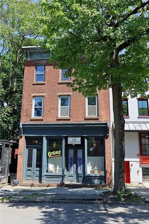 Classic Italianate beauty in Newburgh&rsquo;s downtown historic district: nestled amongst other diverse downtown businesses & walkable to 2 colleges, parks, waterfront & transit - this 3-story treasure greets you with its 19th century details: ornate sign board above the large storefront windows and original sets of matching double doors & transom windows. The doors on the right take you into the commercial space, running the full depth of the building & out to the fenced backyard/terrace. The left set of doors (residential) take you to an entry foyer and laundry room on the 1st fl - then up to the two very spacious apartments on the 2nd & 3rd flrs (1 & 2 BRs respectively). Additionally, each apartment has a dedicated living rm, dining rm, kitchen, full bath with tub/shower, and its own private rear deck! The 3 boilers & water heaters were all replaced at once in the last few years as well. This is a really special building, in a really great location. Don&rsquo;t miss your chance to own this one!