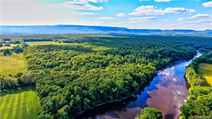 80 level acres on The Wallkill River, in the Town of Gardiner, Ulster County, about 70 miles from GW Bridge. Over 1400 feet of River Frontage, with large neighboring parcels to North and South, a wonderful private setting. 1450 feet of road front on Albany Post Road, a County Route running from Montgomery to New Paltz. Zoning is R.A., allowing 5 acres per homesite. A nice old roadbed runs along the northern border of this parcel to the remains of an ancient brick building. This land is mostly wooded, with some mixed in meadows, and grading down to the Riverfront. This is natural private retreat for your family hideaway, or potential subdivision to feed the short supply of building lots today. Fishing, boating, bathing on your own long stretch of the Wallkill River, one of the few, North Flowing Rivers in NYS. COME AND SEE!